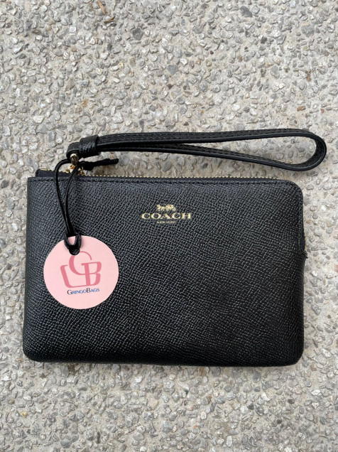 Muñequera coach negra sales