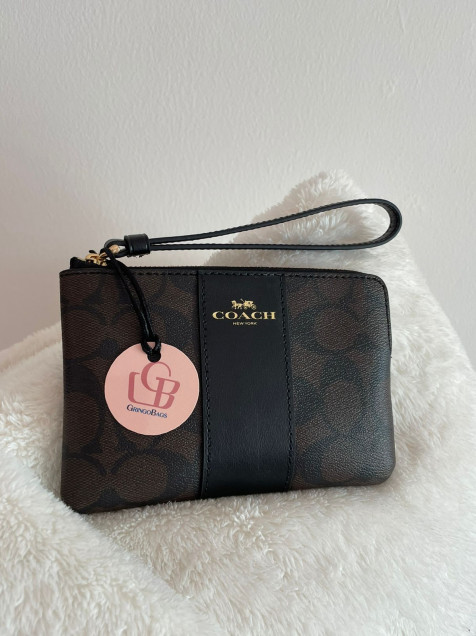 Mu equera Coach con Cremallera Color Negra con Monogram