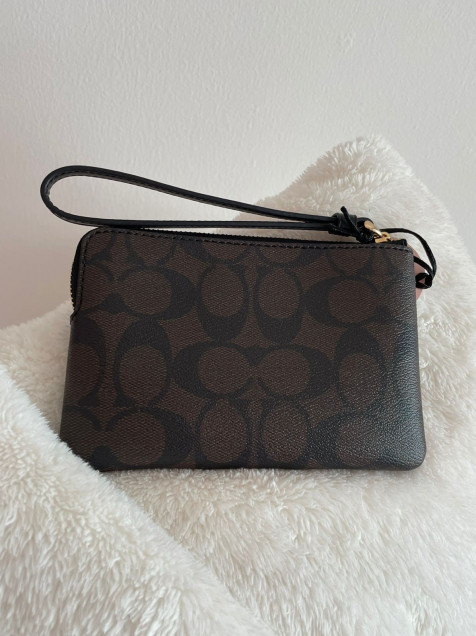 Muñequera best sale coach negra